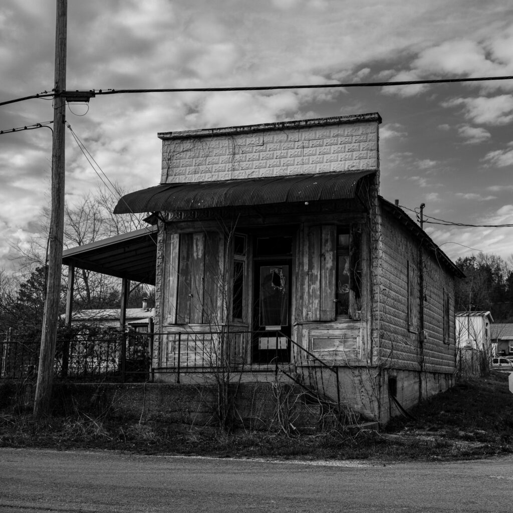Abandoned shotgun shack Lesterville MO – small abandoned house across from first Dollar General store Lesterville Missouri