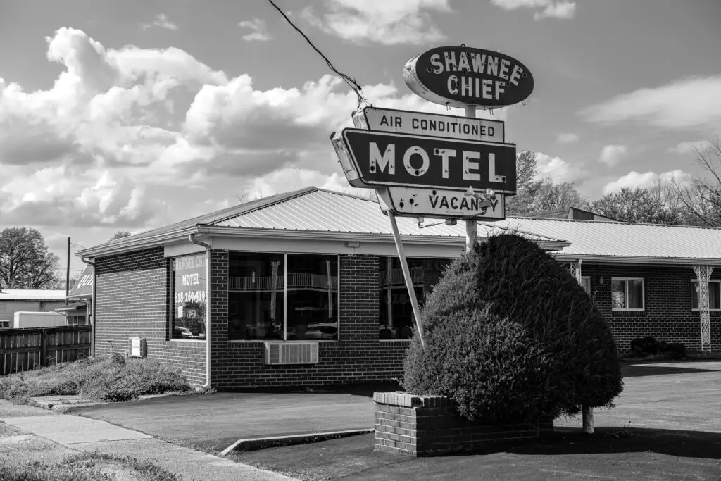 Shawnee Chief Motel neon sign and exterior in New Shawneetown Illinois, photographed April 7, 2021