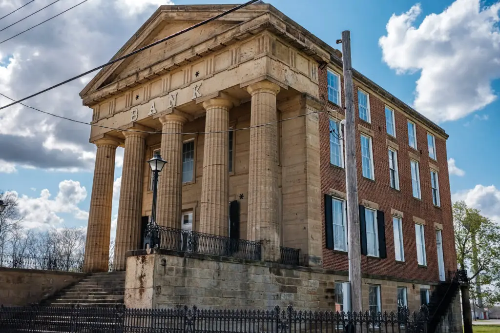 Side view of Old Shawneetown Bank showing columns and brick walls