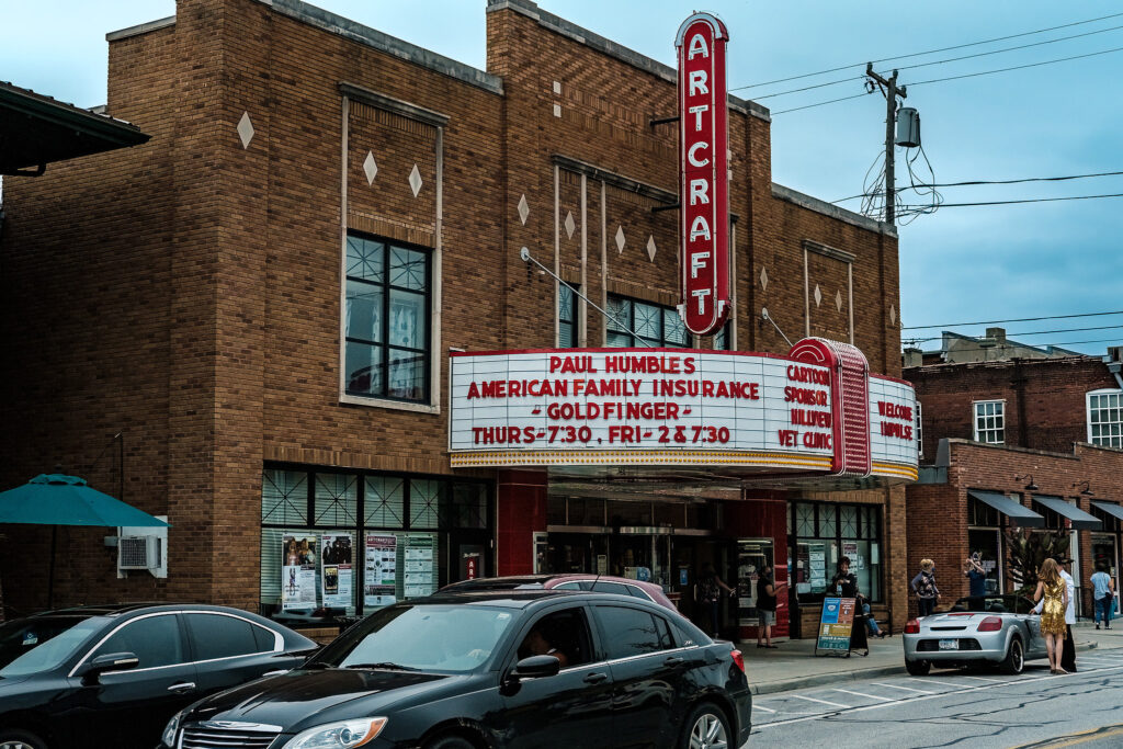 Side view of the Artcraft Theatre in Franklin, Indiana, highlighting its marquee and restored exterior.