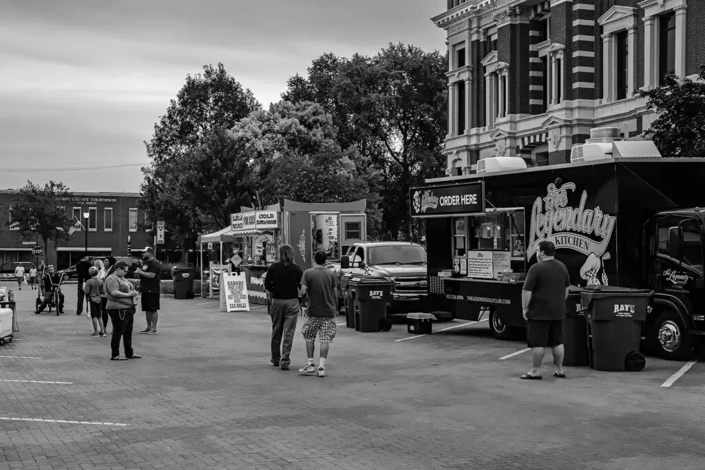 Food trucks gathered next to the Johnson County Courthouse in Franklin, Indiana, during a Friday evening summer event.