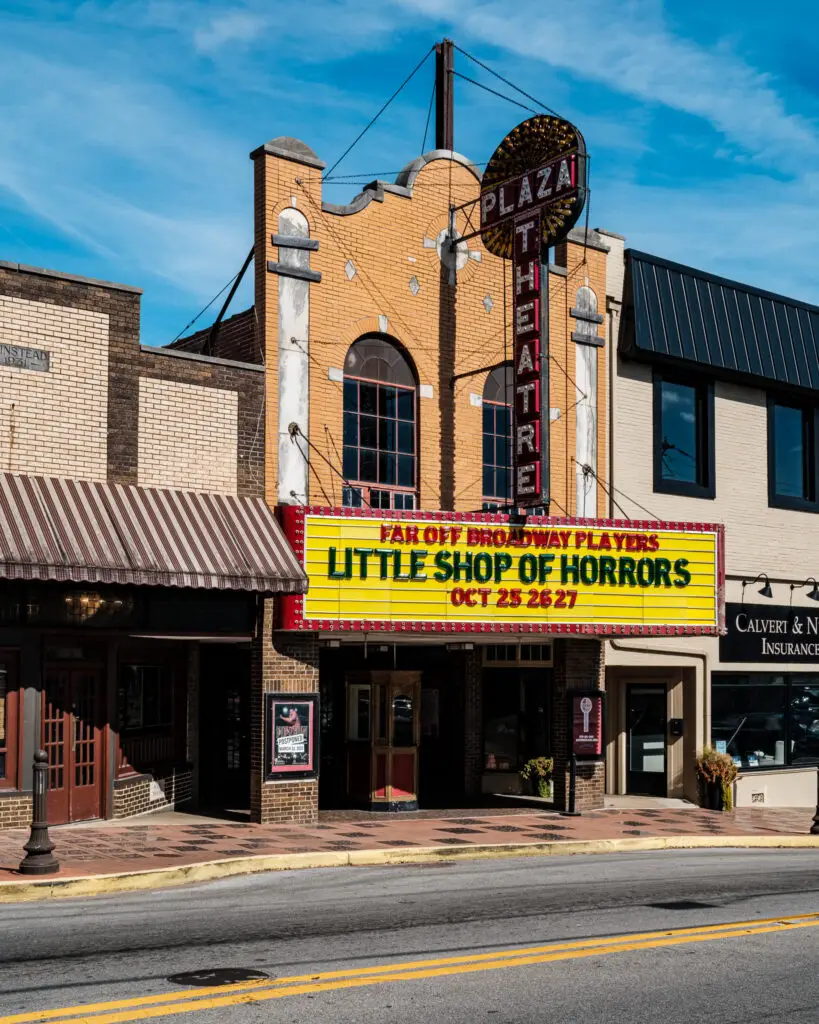 Color photograph of the historic Plaza Theatre at 115 East Main Street, Glasgow, Kentucky, viewed from the opposite direction along Main Street.