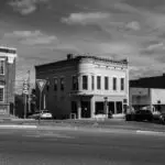 Black-and-white wide shot of the Third National Bank at 112 North Green Street, Glasgow, Kentucky, capturing more of the building’s scale and street setting.